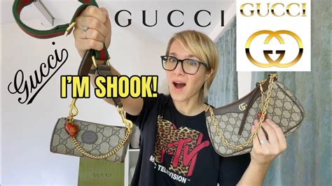 I’m SHOOK! Gucci Ophidia bag strap and strawberry charm.